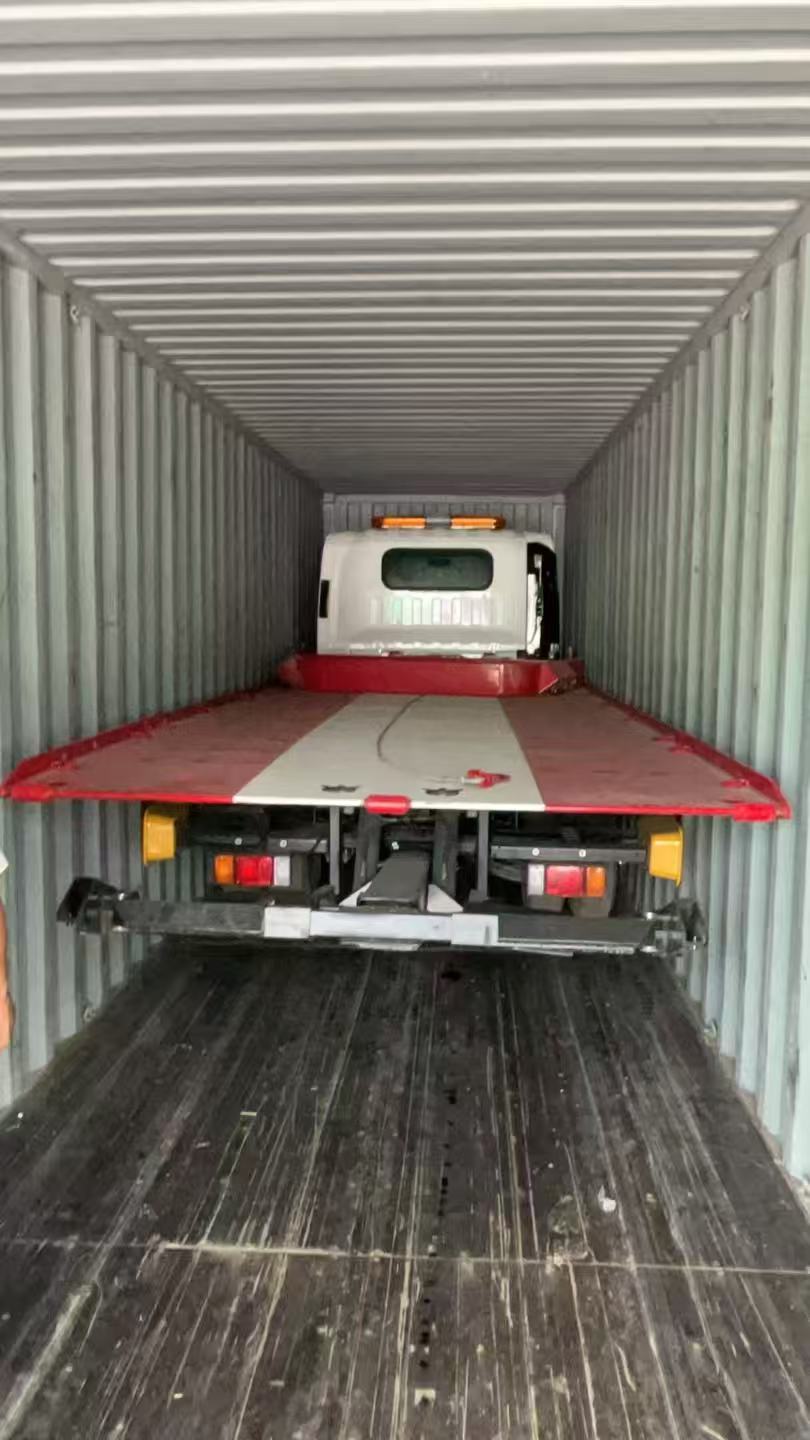 2 unit ISUZU KV600 tow trucks load in a 40HQ container to El Salvador(图2)
